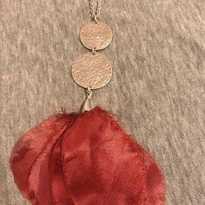Long necklace with petals on the end
